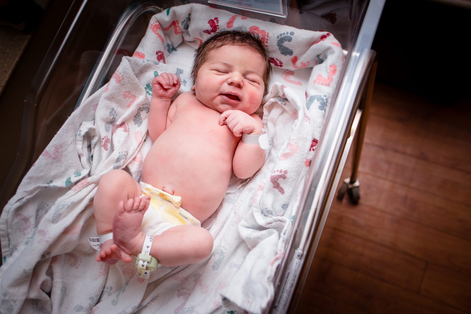 fresh 48 photo of new baby in hostpital bassinet